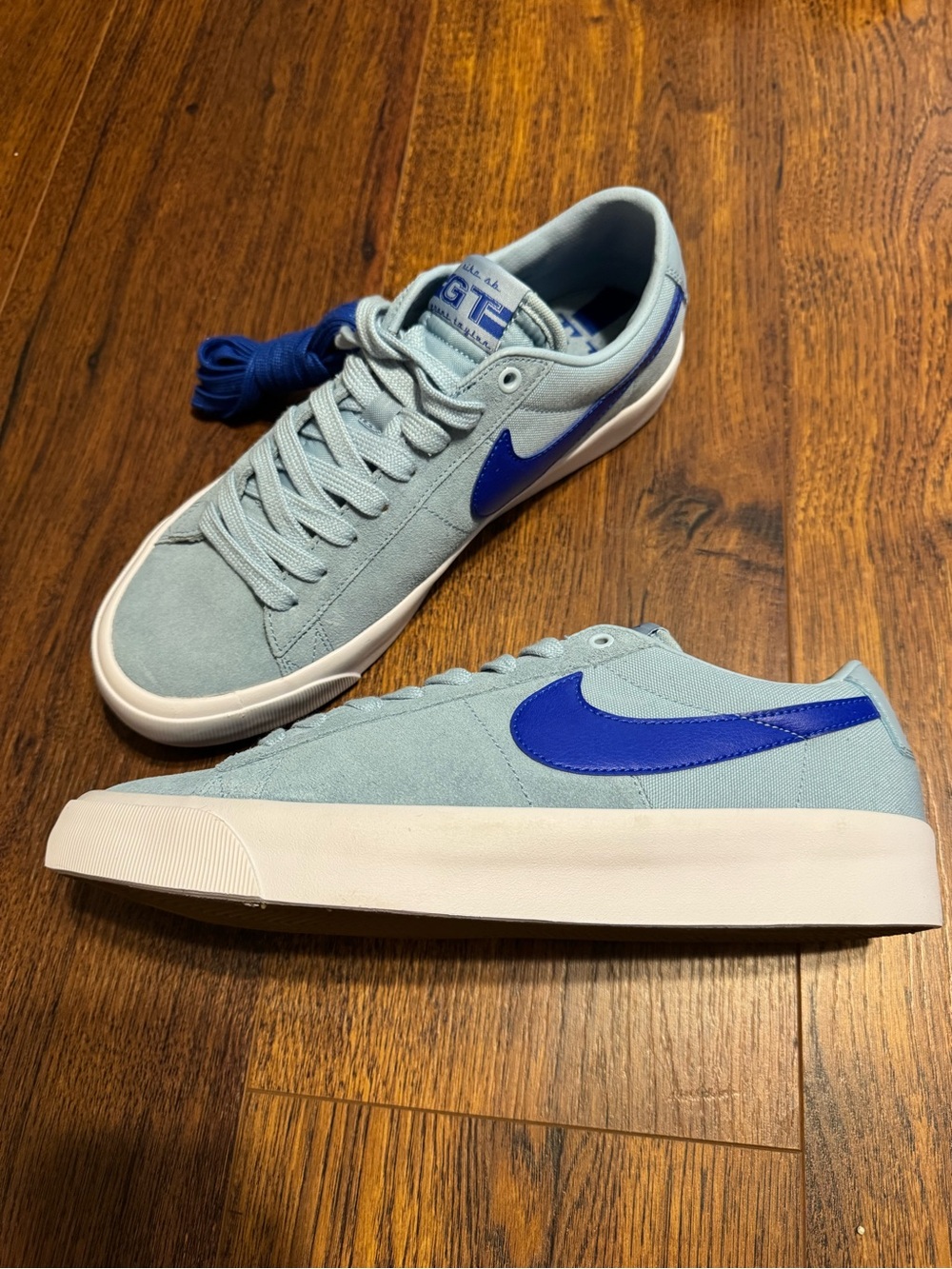 Nike Men’s Light Blue Suede Sneakers with Blue Swoosh